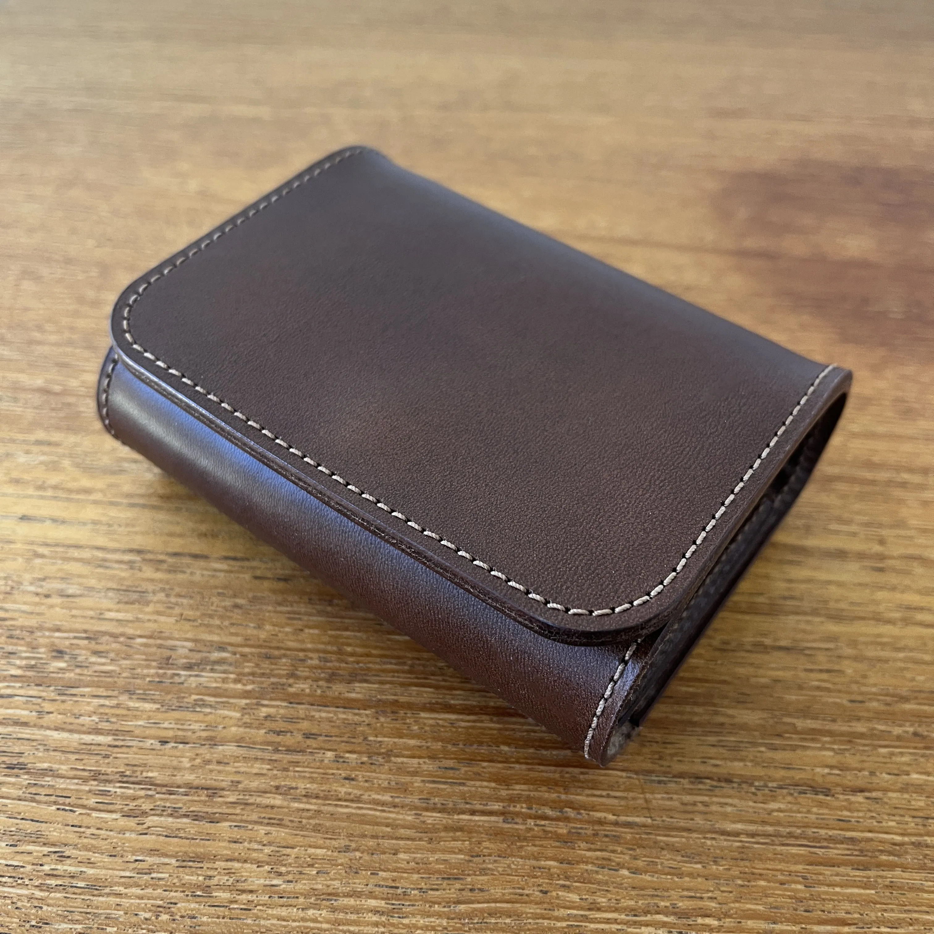 CARGO CLUTCH   CHOCOLATE BROWN
