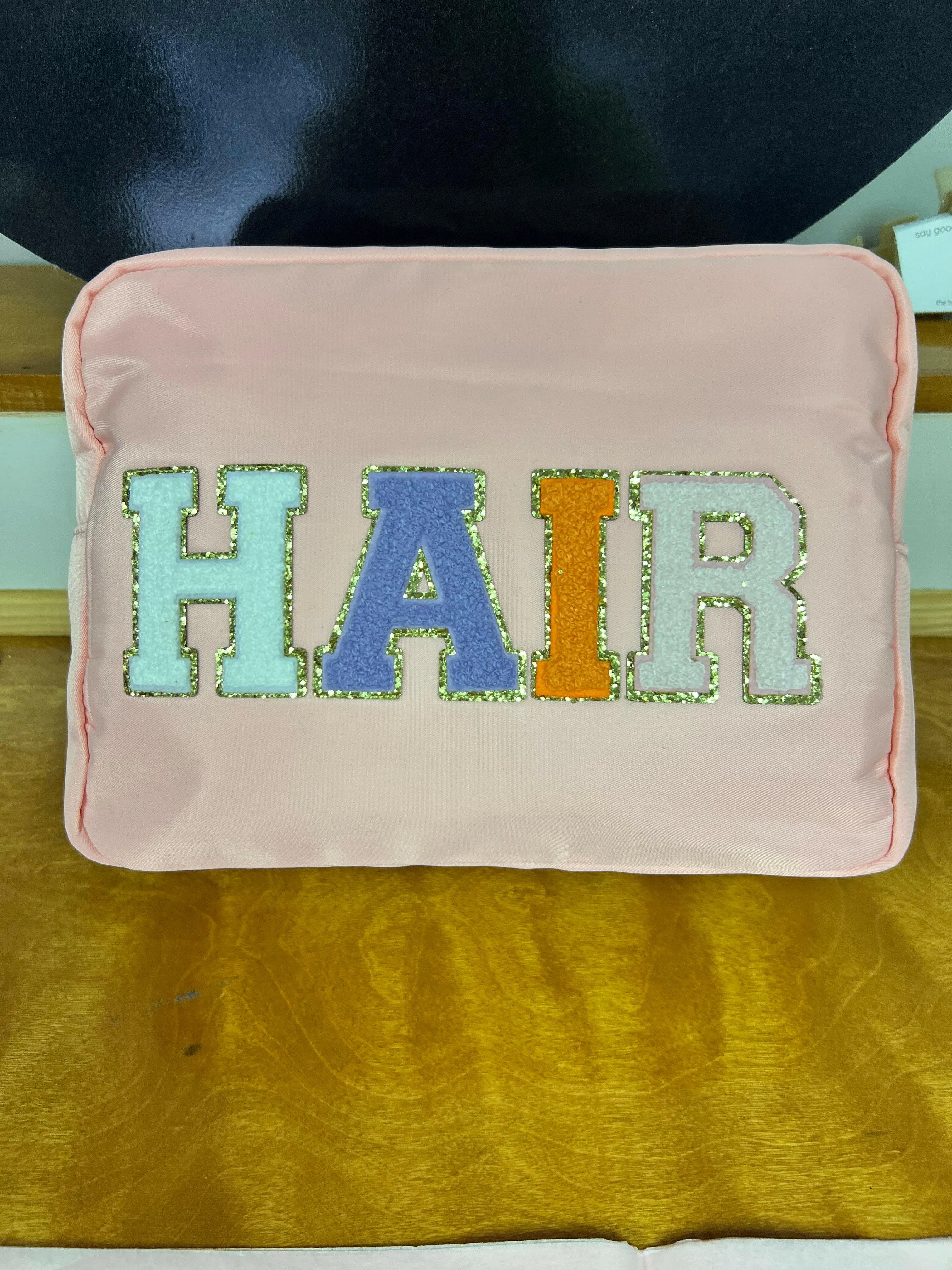 HAIR Xl Nylon Varsity Pouch - Pink with Multi Colored Patch Gold Lettering