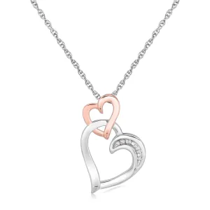 Sterling Silver Cascading Dual Heart Diamond Accented Pendant .02 cttw