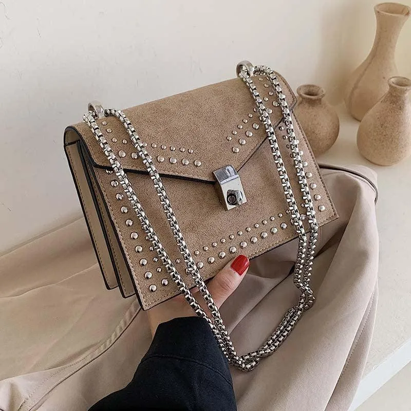 SUEDE STUDDED BAG WITH SILVER CHAIN