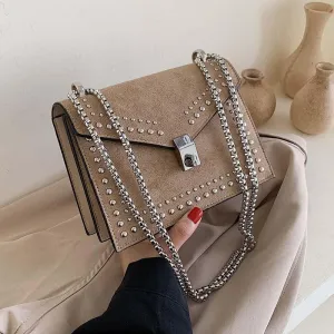 SUEDE STUDDED BAG WITH SILVER CHAIN