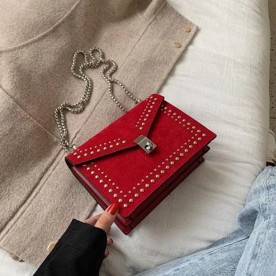 SUEDE STUDDED BAG WITH SILVER CHAIN