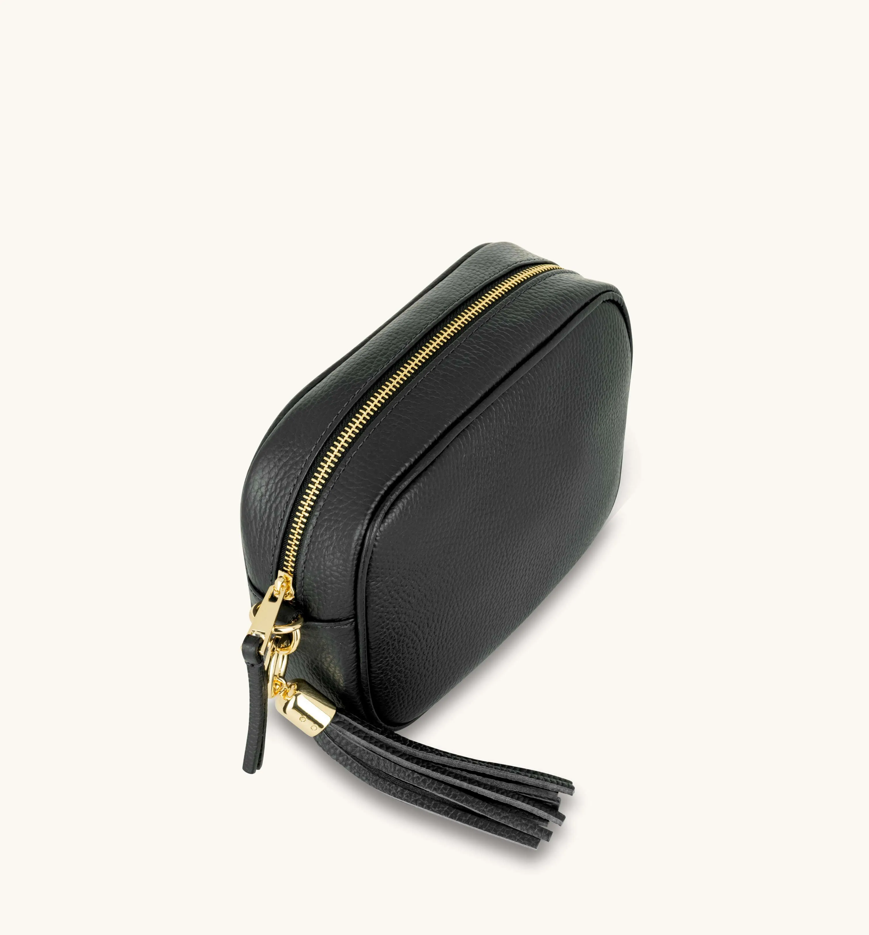 The Tassel Black Leather Crossbody Bag With Latte Stripe Strap