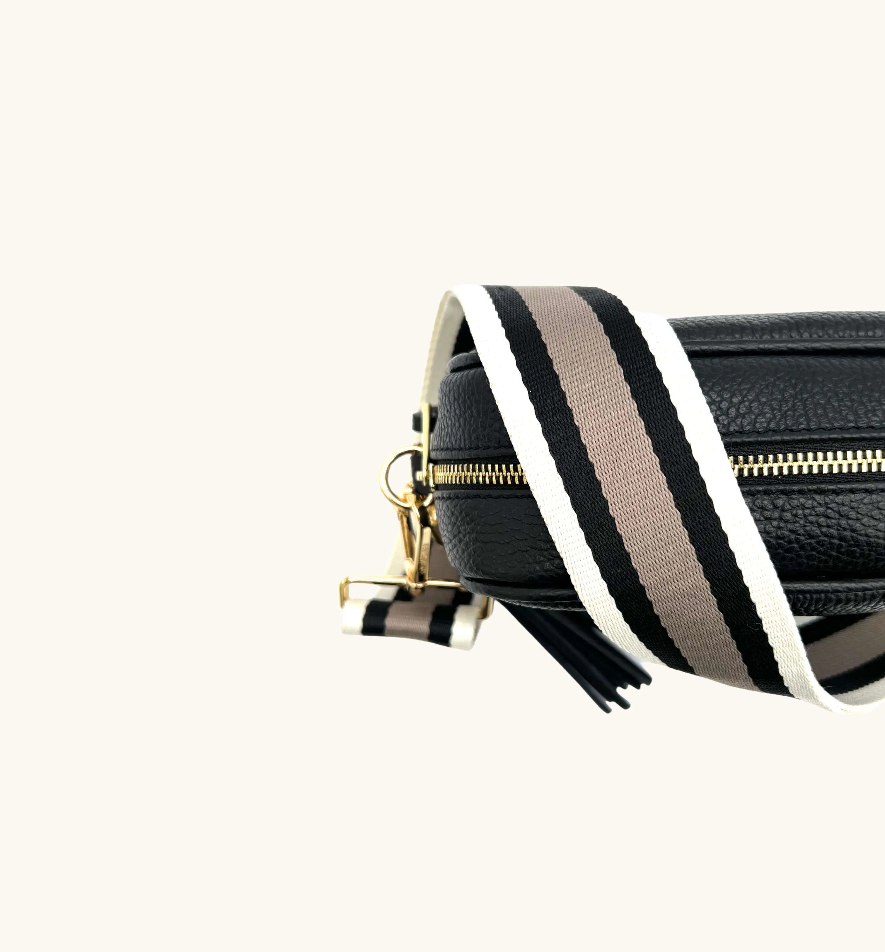The Tassel Black Leather Crossbody Bag With Latte Stripe Strap