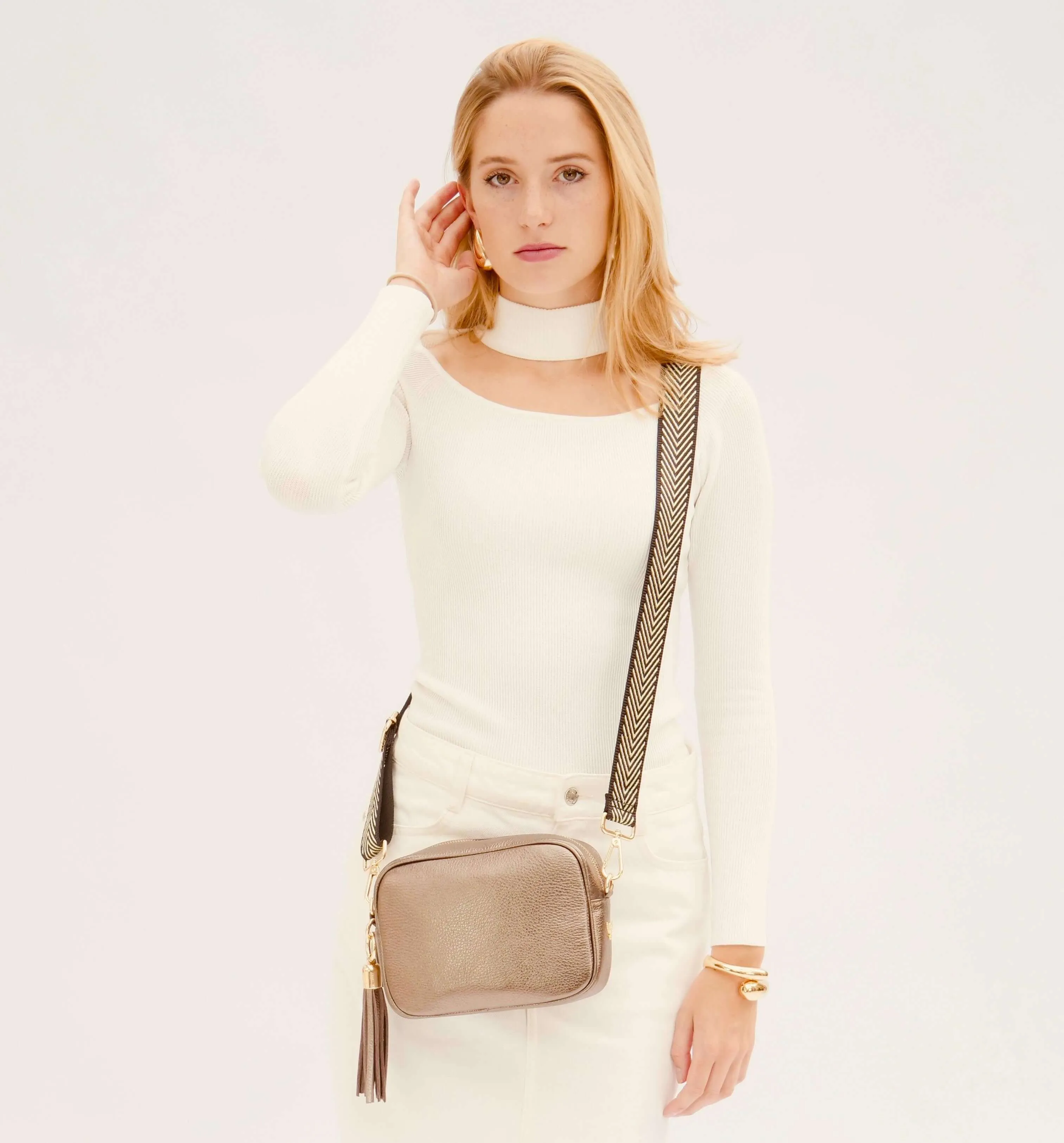 The Tassel Bronze Leather Crossbody Bag With Black & Gold Chevron Strap