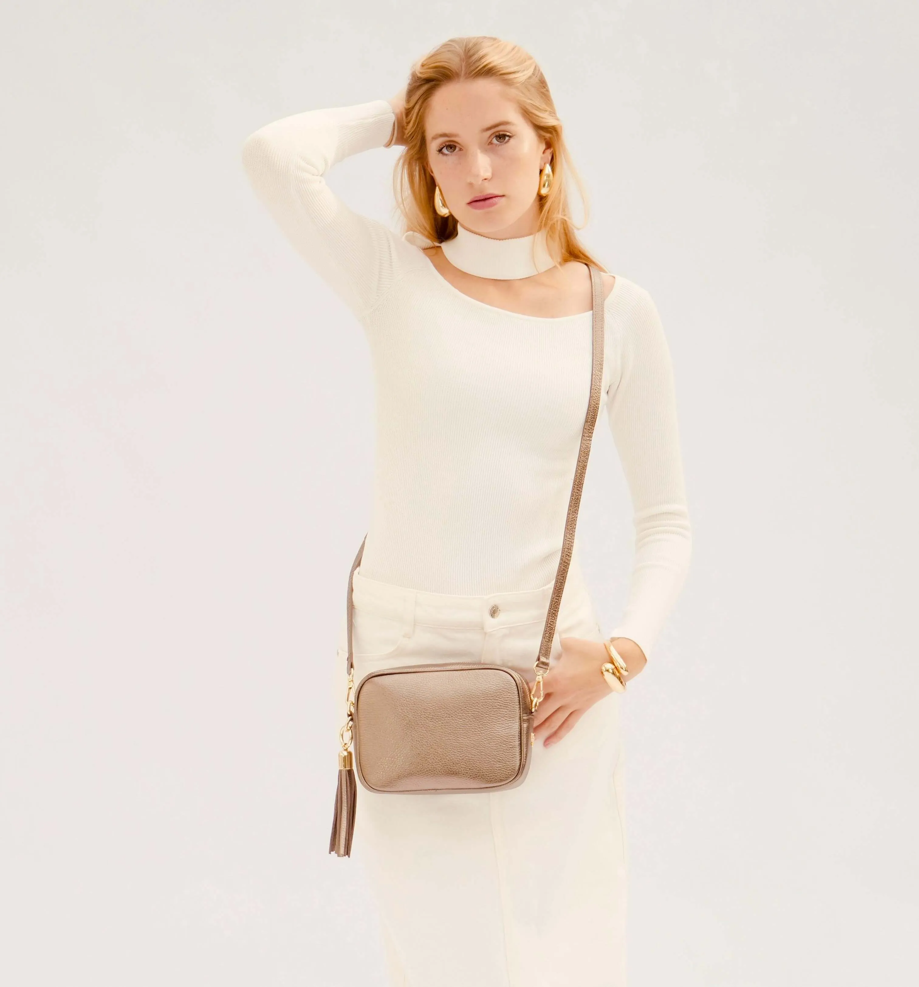 The Tassel Bronze Leather Crossbody Bag With Black & Gold Chevron Strap