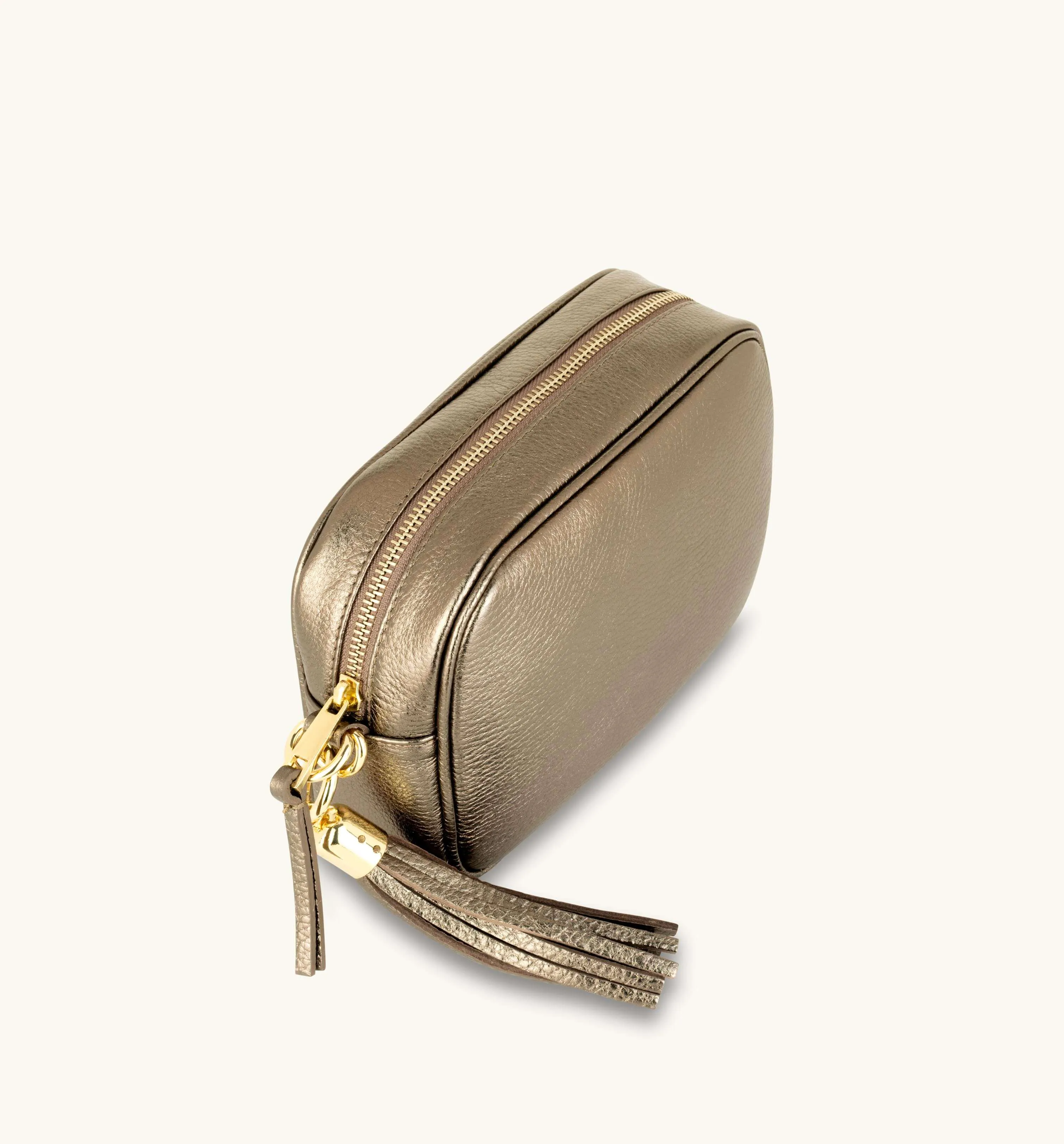 The Tassel Bronze Leather Crossbody Bag With Black & Gold Chevron Strap