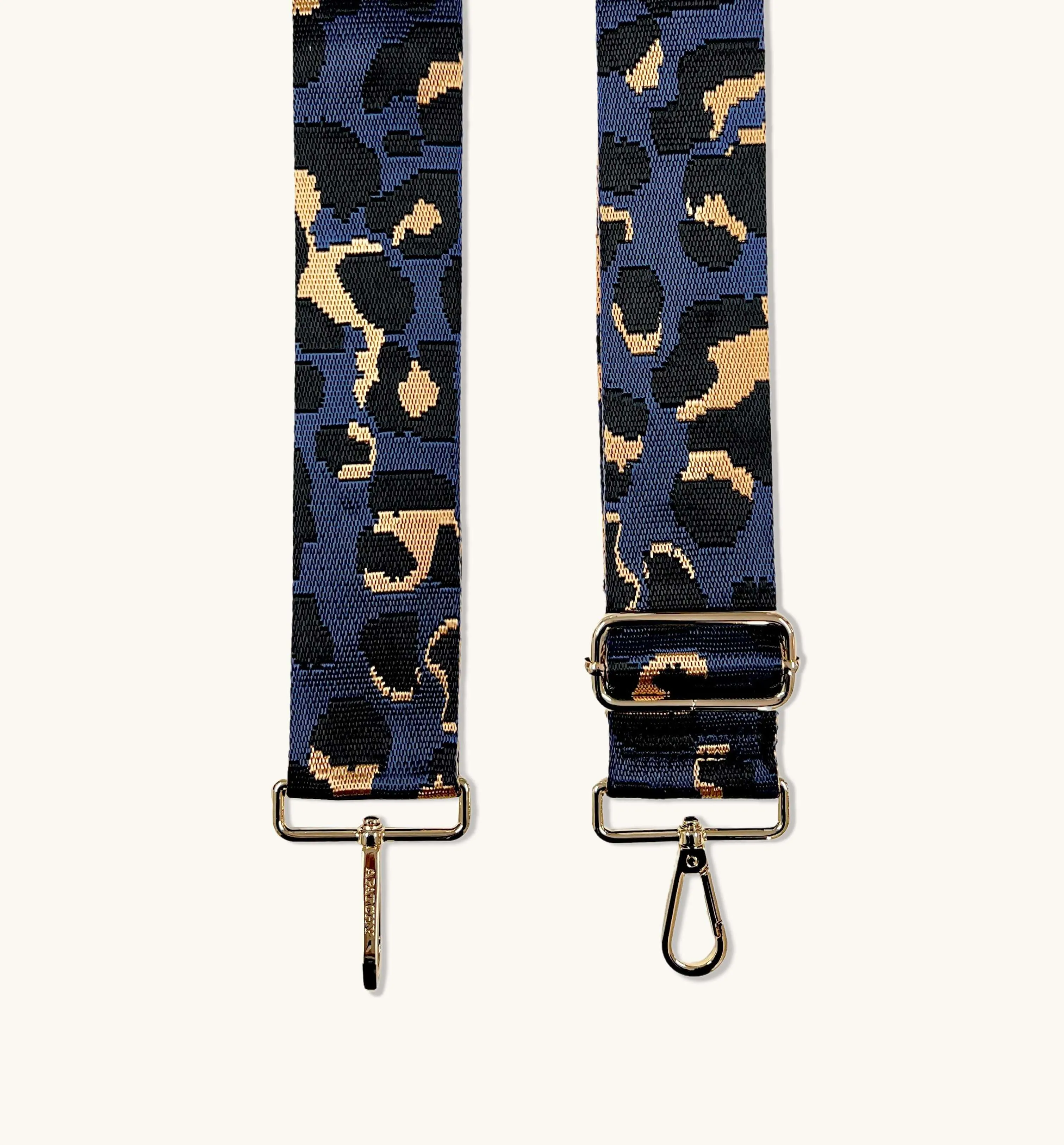 The Tassel Navy Leather Crossbody Bag With Navy Leopard Strap