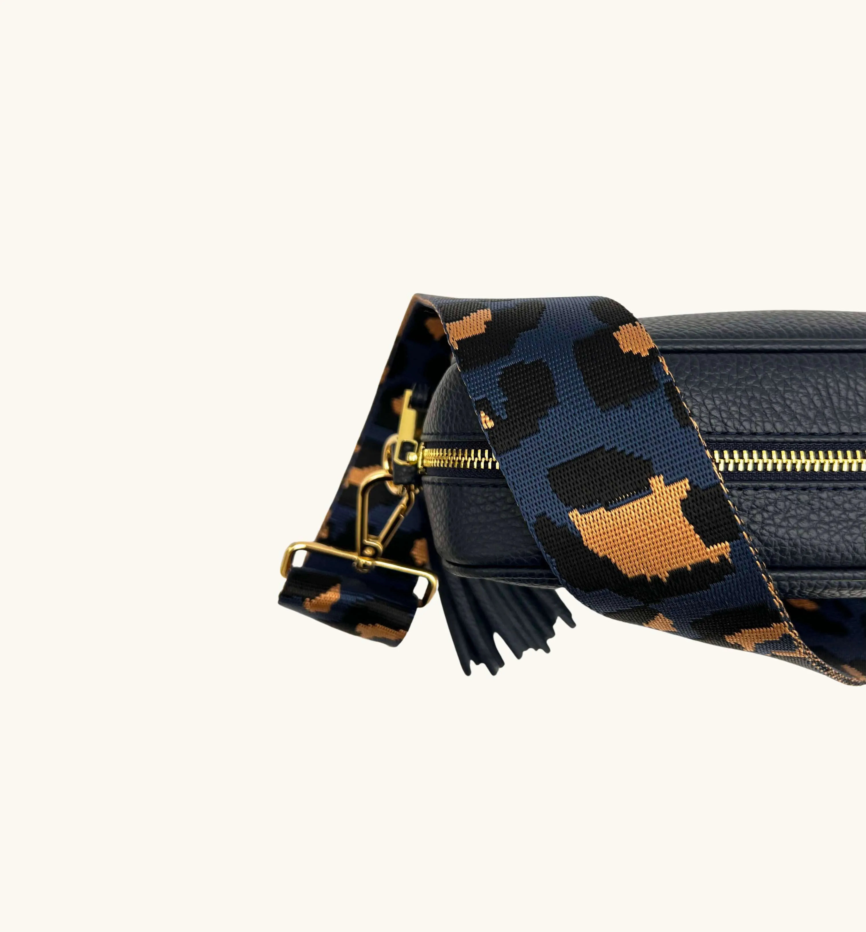 The Tassel Navy Leather Crossbody Bag With Navy Leopard Strap
