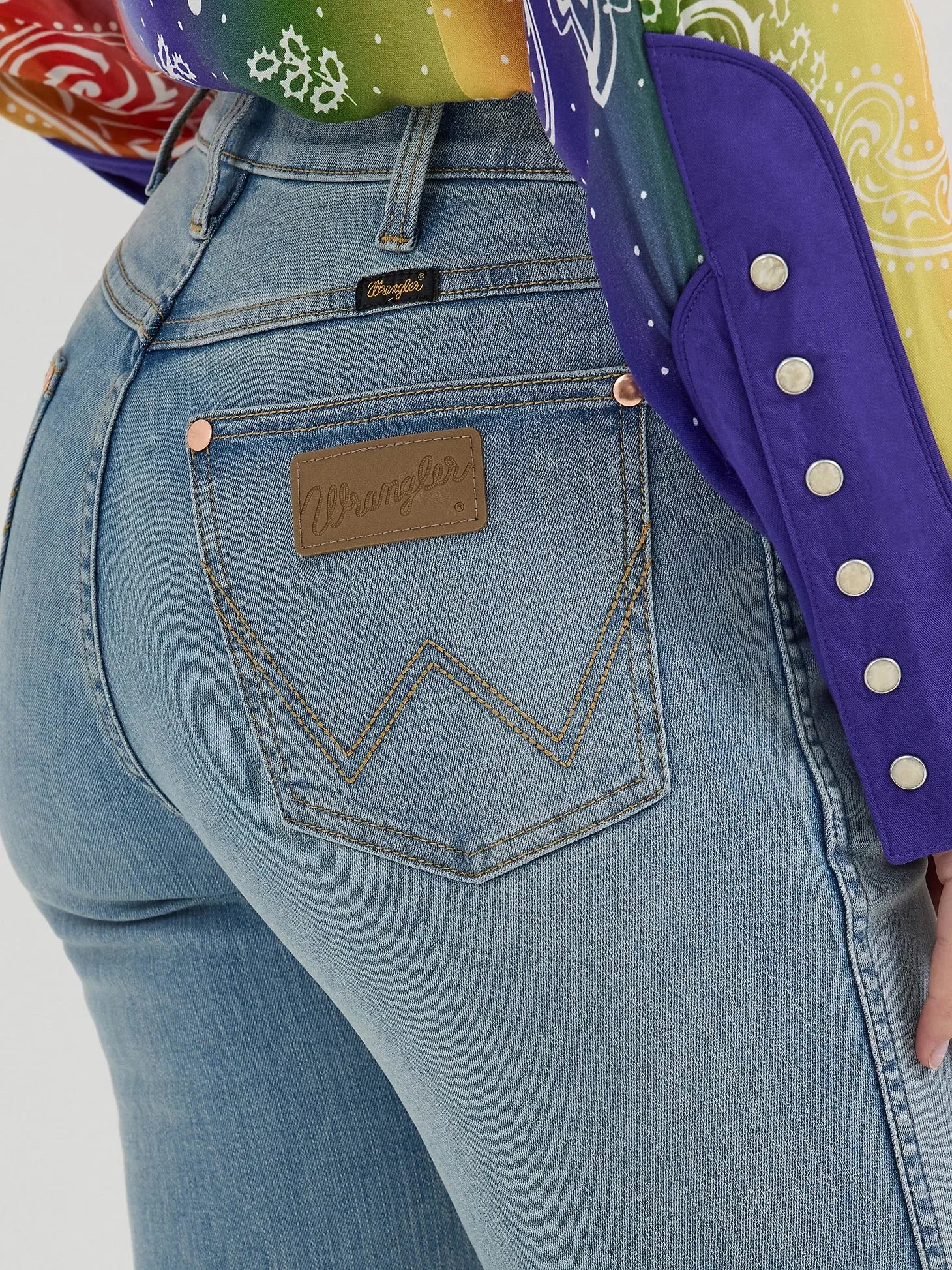 Wrangler x Lainey Wilson Raw Hem Boot Hugger Womans Jeans